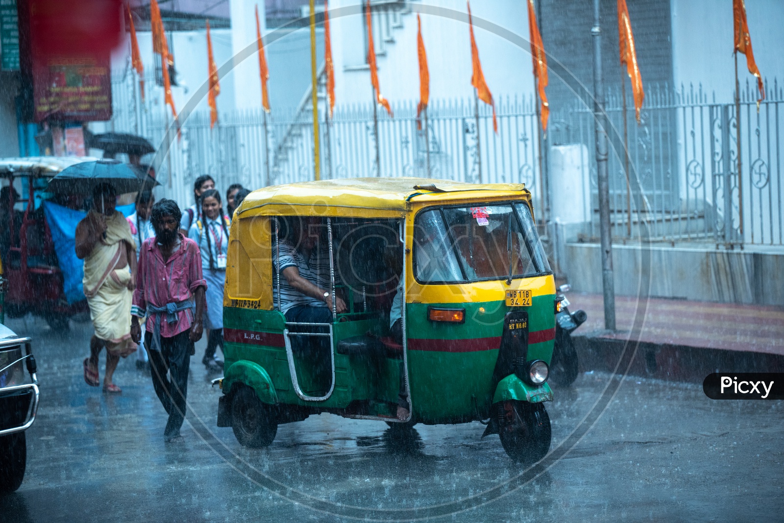 Auto Rickshaws  on the Roads Of Howrah  in A Heavy Rain  Due To cyclone Fani