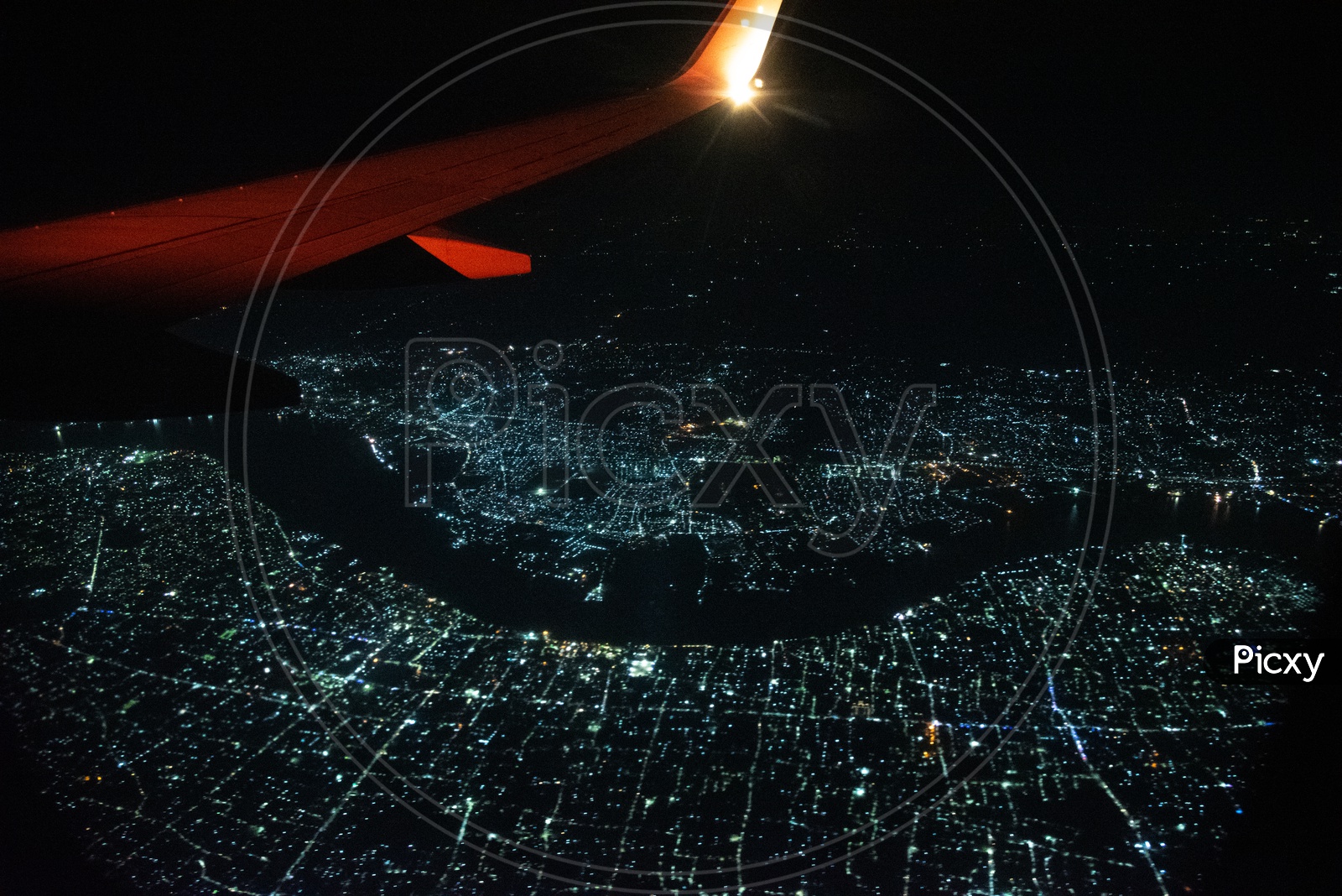 Aerial View Of City Scape Of  Kolkata  And  Kolkata  Roads In Night  Time  From a  Flight Window