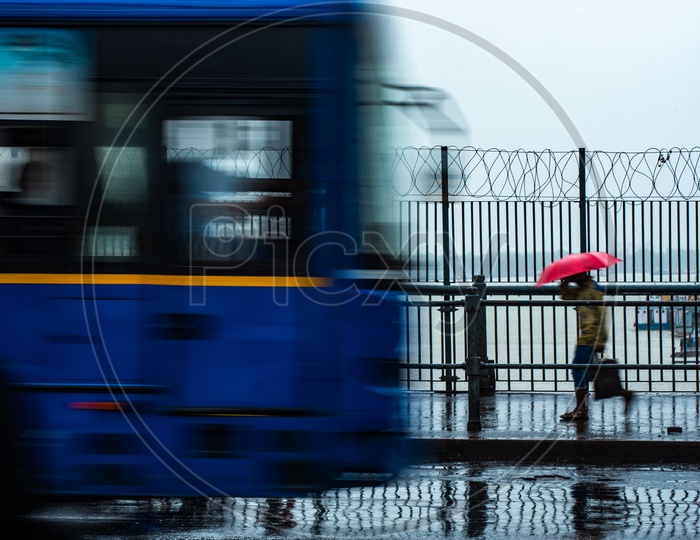 Pedestrians  Using  Umbrellas  To Take Cover From The Heavy Rain  in Kolkata  Due To  Cyclone  Fani