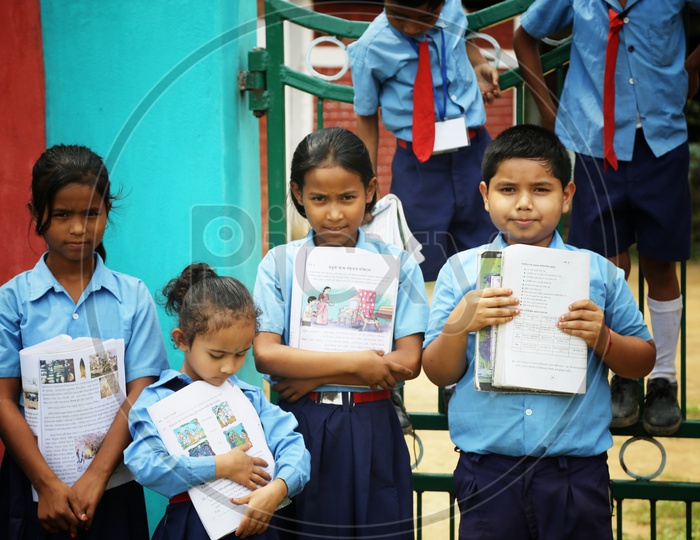 School Children Wearing School Uniforms With Happily Smiling Faces In a Shchool Premise