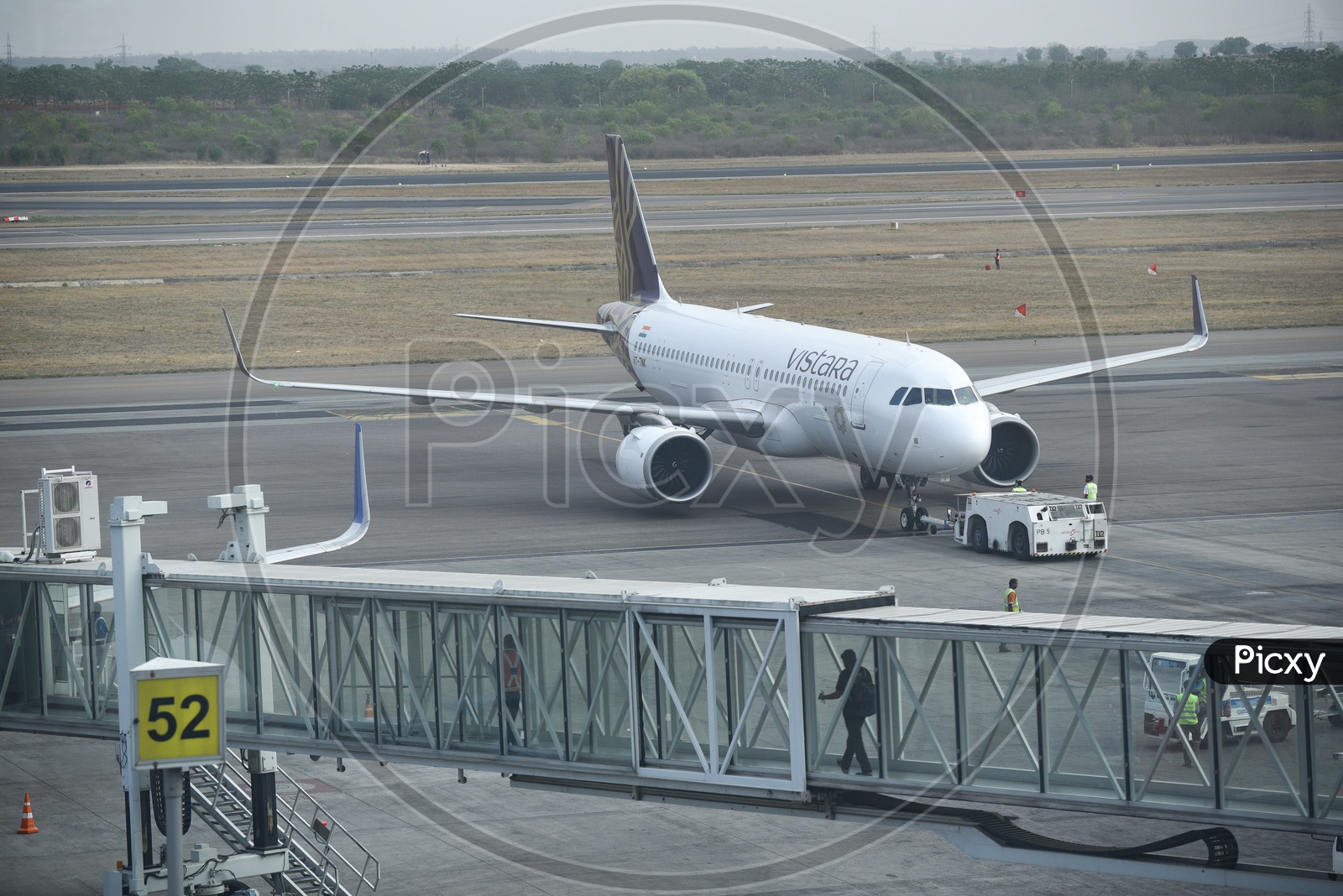 Vistara  Flight  Parked In An Airport