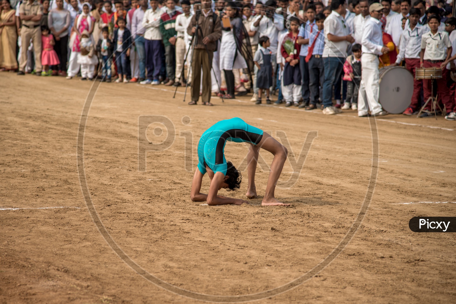 A School Girl Performing Gymnastics At  Independence Day Parade