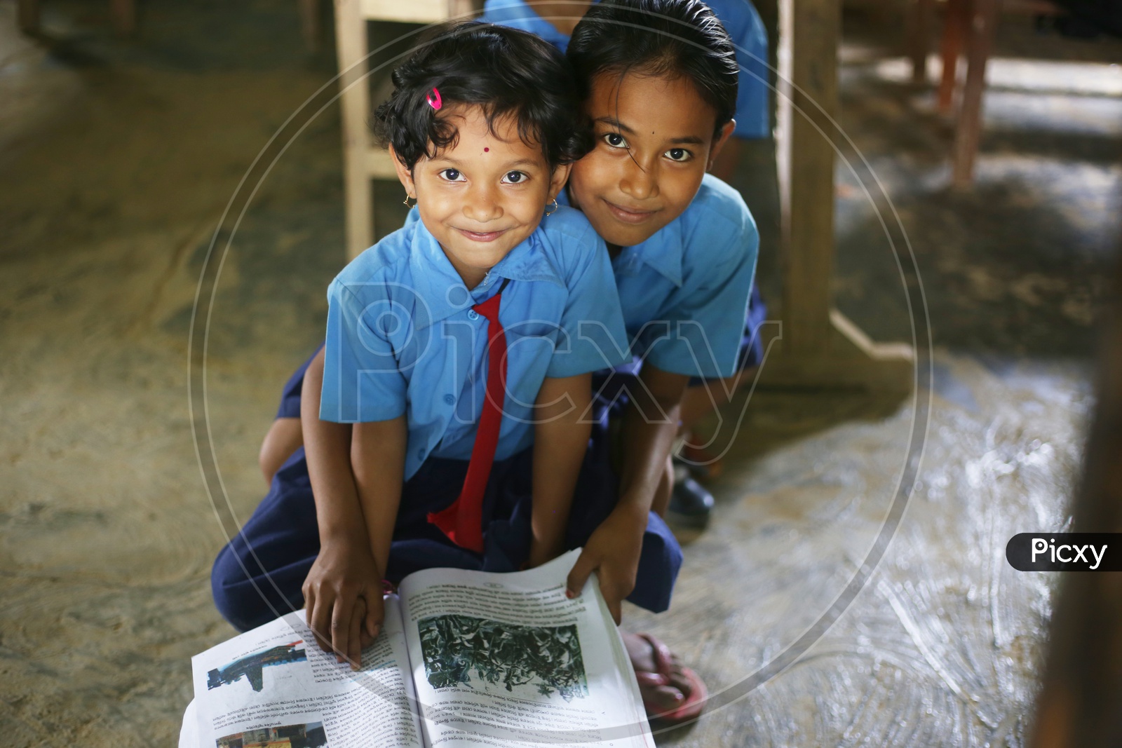 School Children Or School Students Wearing Uniforms In a Classrooms With Books
