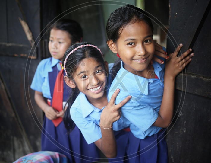 School Children Or School Students Wearing School Uniforms   With Smiling Faces and Having Fun and Joy in School