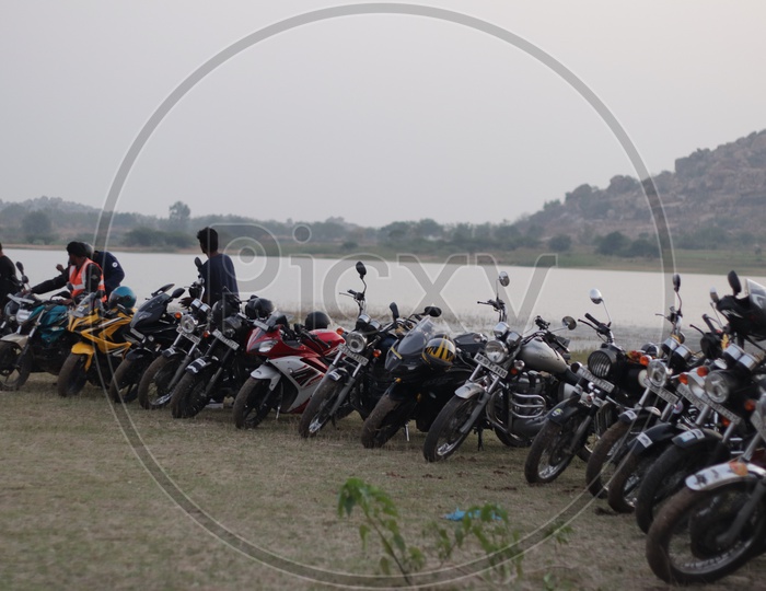 Motorbikes lined up after a ride to Koilsagar reservoir