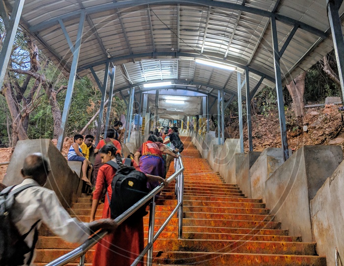 Devotees climbing steps at the foot trail to tirumala