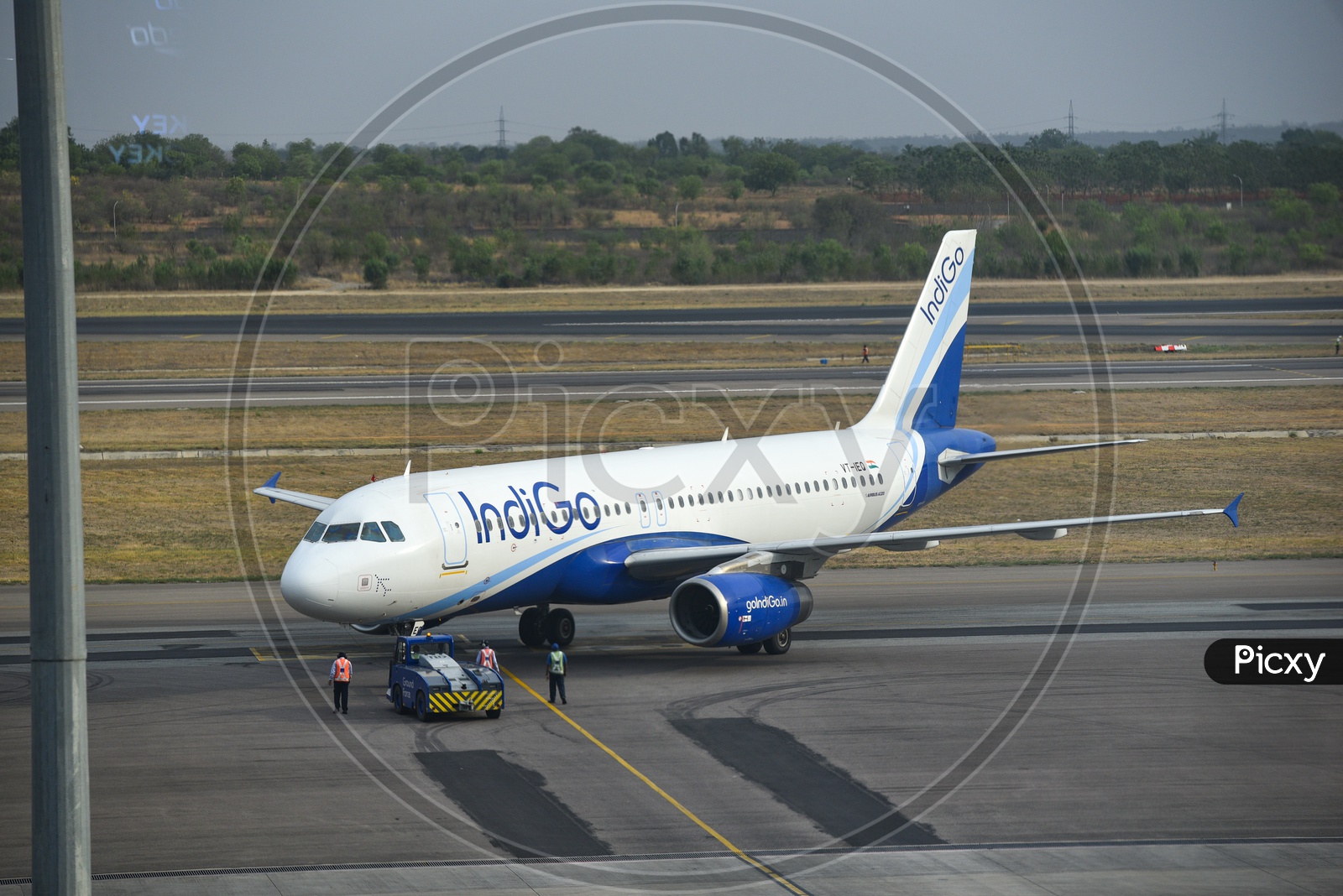 Indigo  Flight  Parked In an Airport