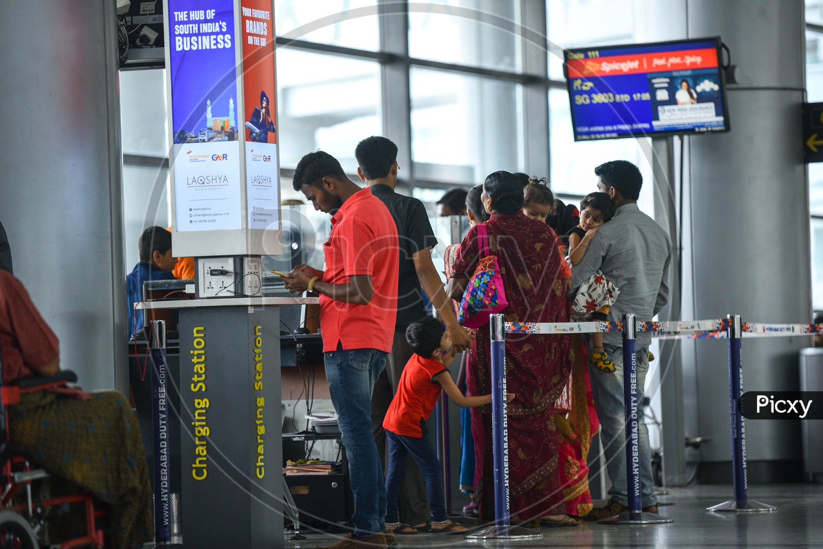Passengers  Checking In at The Entry  Gates  In an Airport