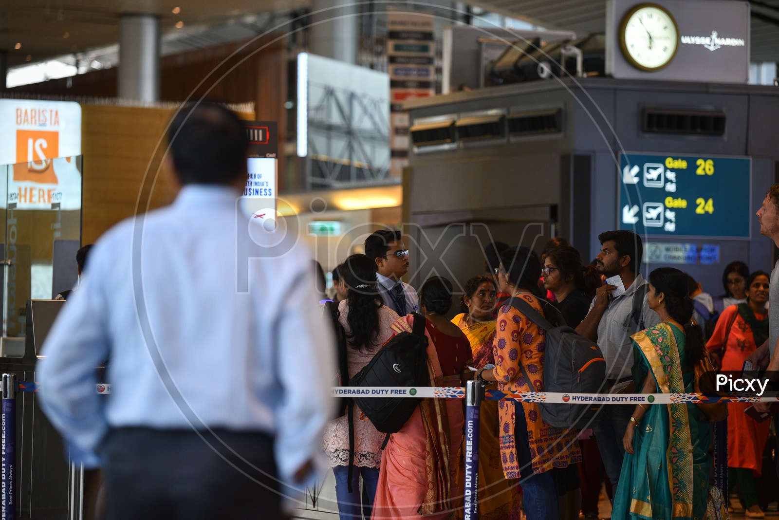 Passengers  Waiting In Queue Lines  At Airport  For  Security Check