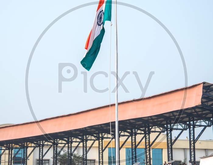 Officials Hoisting The Indan National Flag In Independence Day   Parade