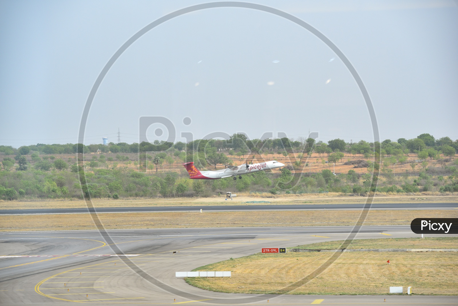 Spicejet  Flight  Taking Off From an Airport