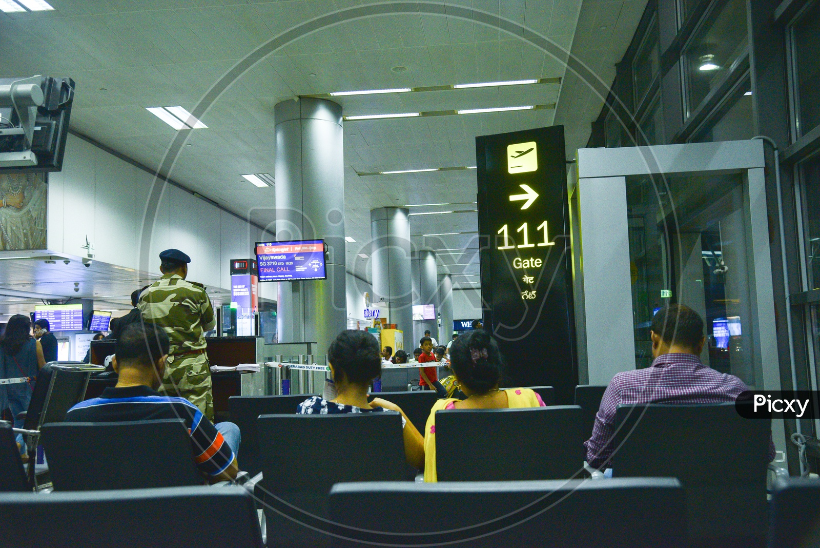 airport Scenes With  Passengers Waiting in the  Waiting Lounge  And Display Screens