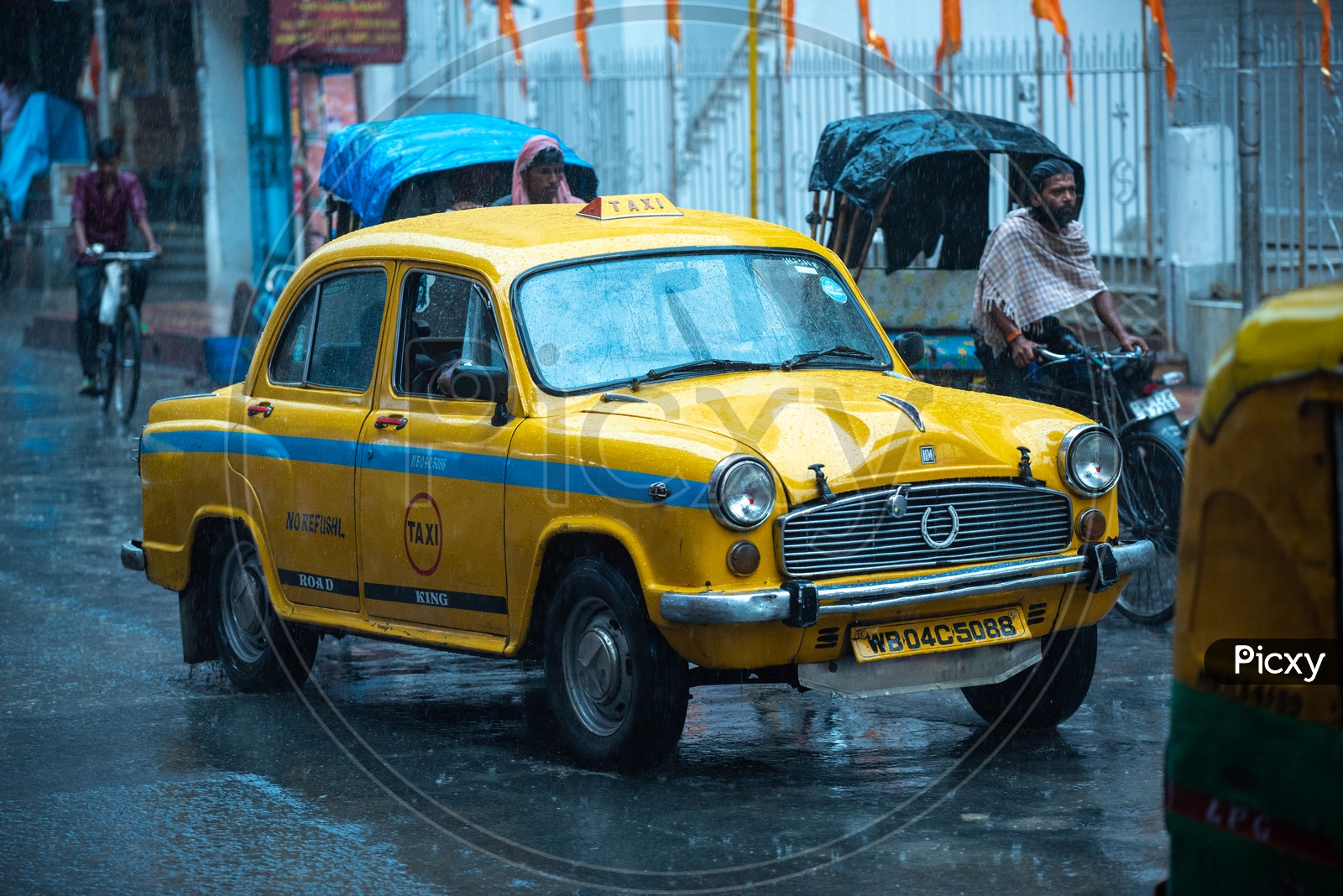 Yellow Cabs Or taxis  Running On the Roads Of Howrah in Heavy Rain Due To Cyclone Fani