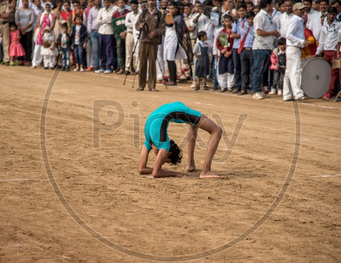 A School Girl Performing Gymnastics At  Independence Day Parade