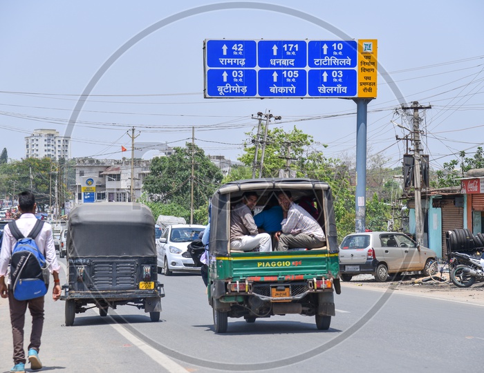 Industrial Daily Workers  Using Share Autos in  Kokar  Industrial Area Road