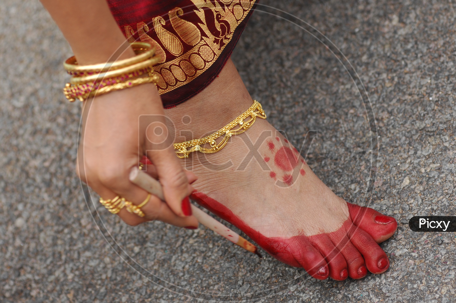 Red Mixture Or Paste Marked Foot  Or Parani  Marked Foot  Of  a Bride