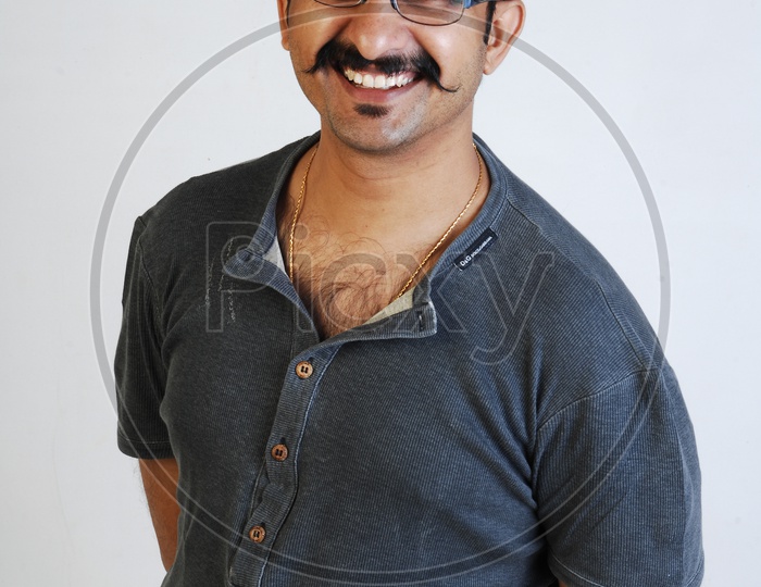 Portrait of Telugu Film  Director And Cinematographer   Teja  With a Smile Face on an Isolated White Background