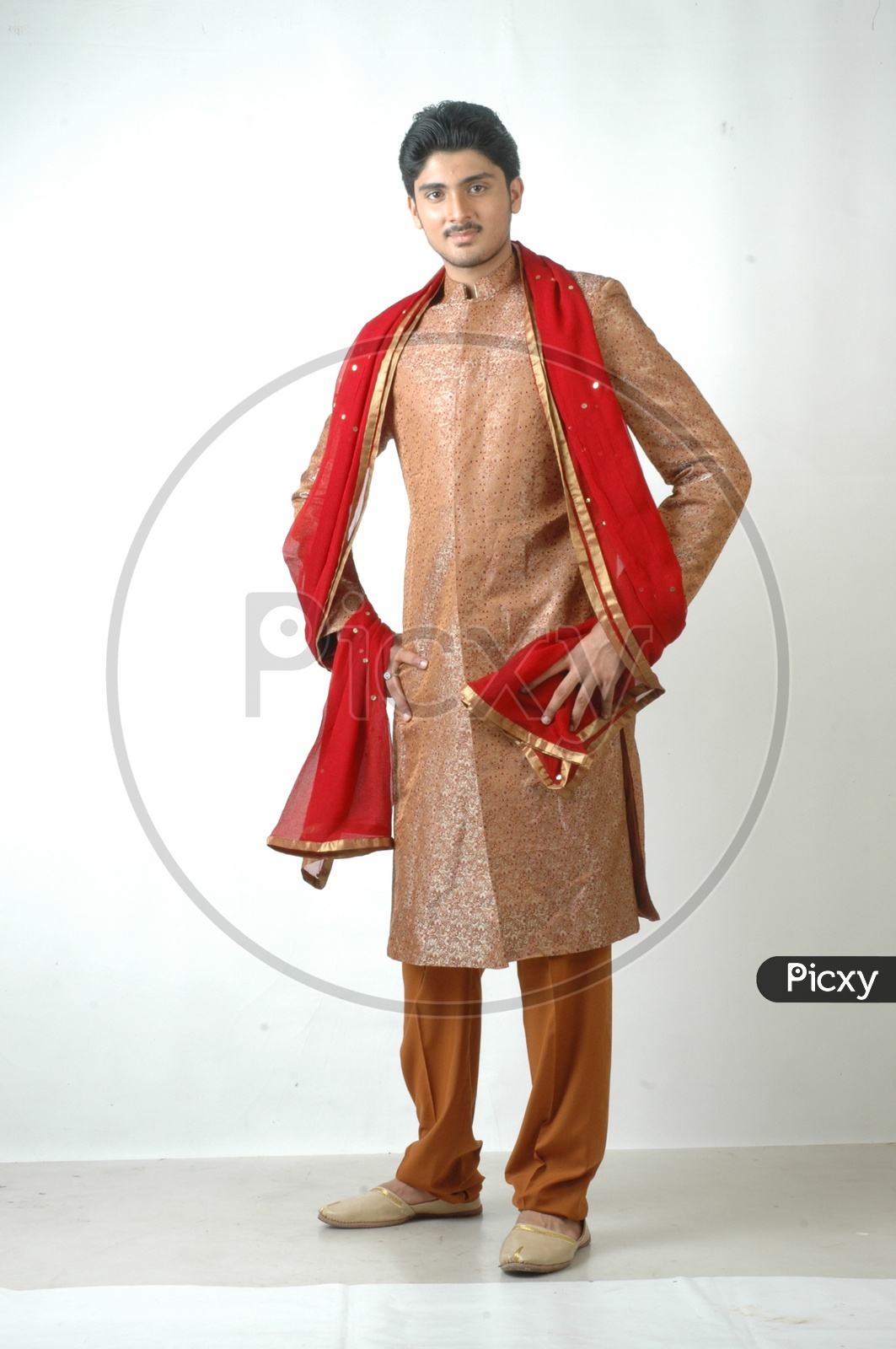 Indian collage boy wears ethnic or traditional outfit kurta / cloths. Male  fashion model in sherwani dress, number & percentage posing / standing  against over isolated on white background Stock Photo | Adobe Stock