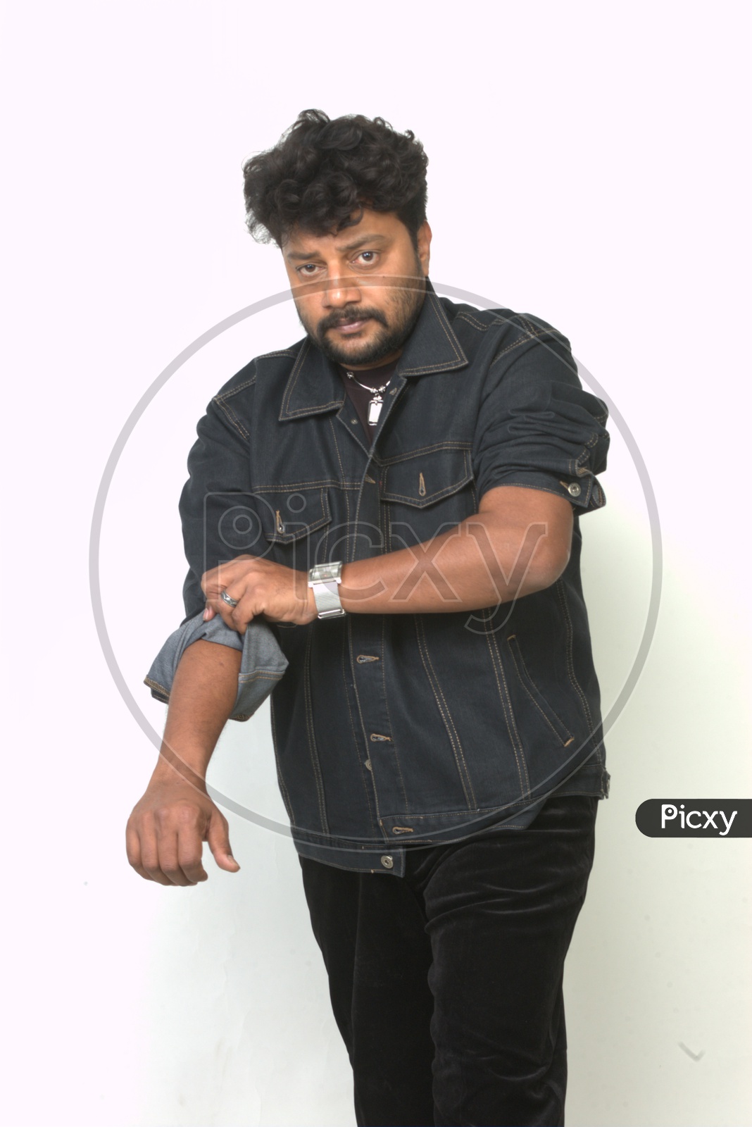 South Indian Actor Sai Kumar  Standing and Posing on an Isolated White Background
