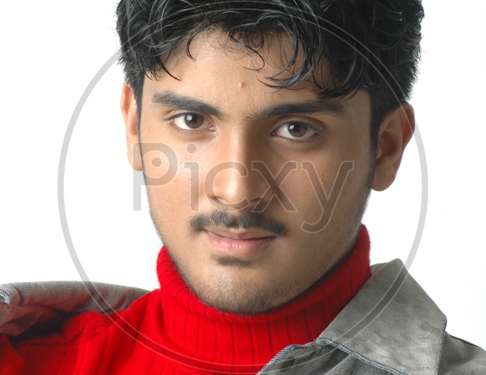 Portrait  Of a Indian Man  With Smile Face On an Isolated Red Background
