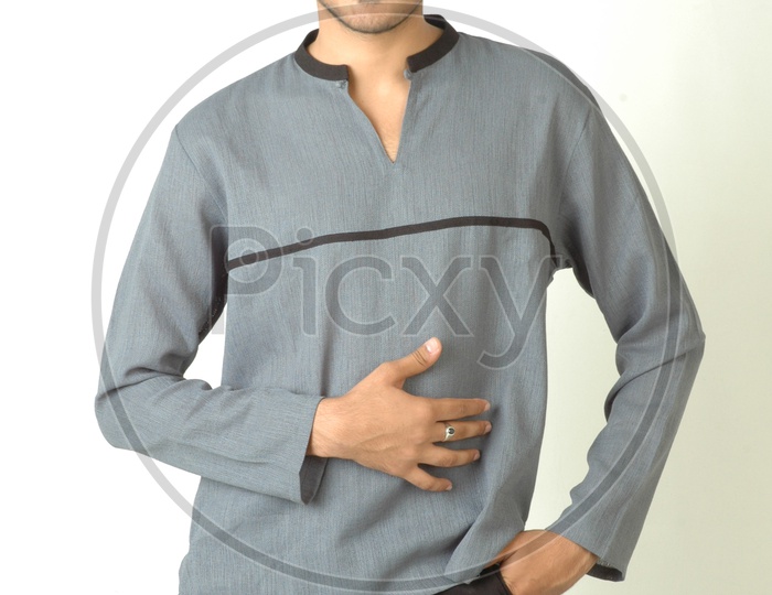 Portrait Of a Young Indian Man  With an Expression and Smile On Face  And Posing On an Isolated White Background