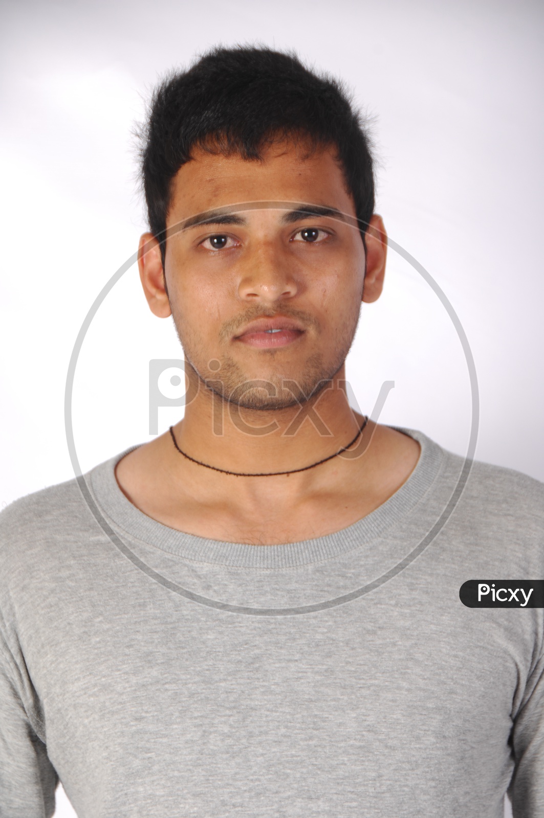 Portrait Of a Indian Man Or Tollywood Movie Character Artist In Casual Dress On an Isolated White Background