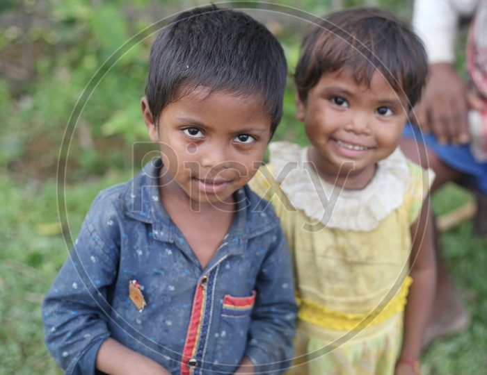 Indian Rural Village Children ( Siblings )  Portrait With  Smiles On their Faces
