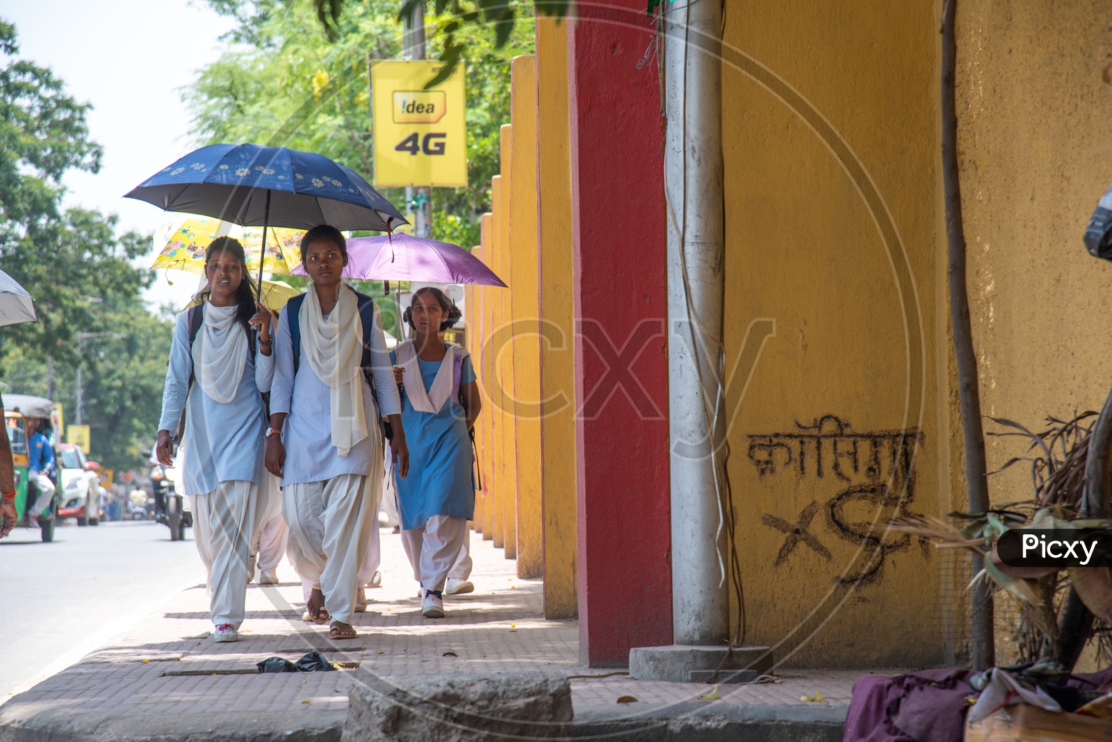 School Girls Taking Shade by Using Umbrellas From Bright Sun While Going To School in Ranchi