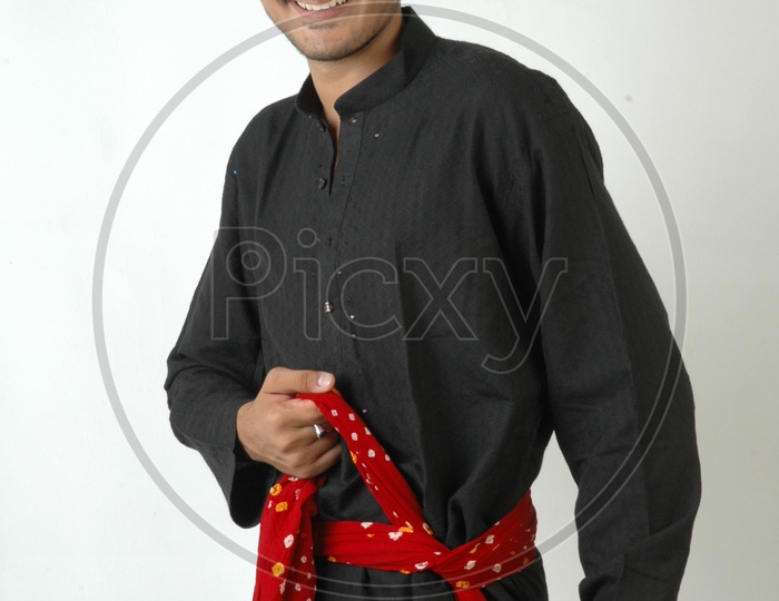 A  Young Indian Man In traditional Wear  or Pyjama  and Posing With a Smile Face On an Isolated White Background