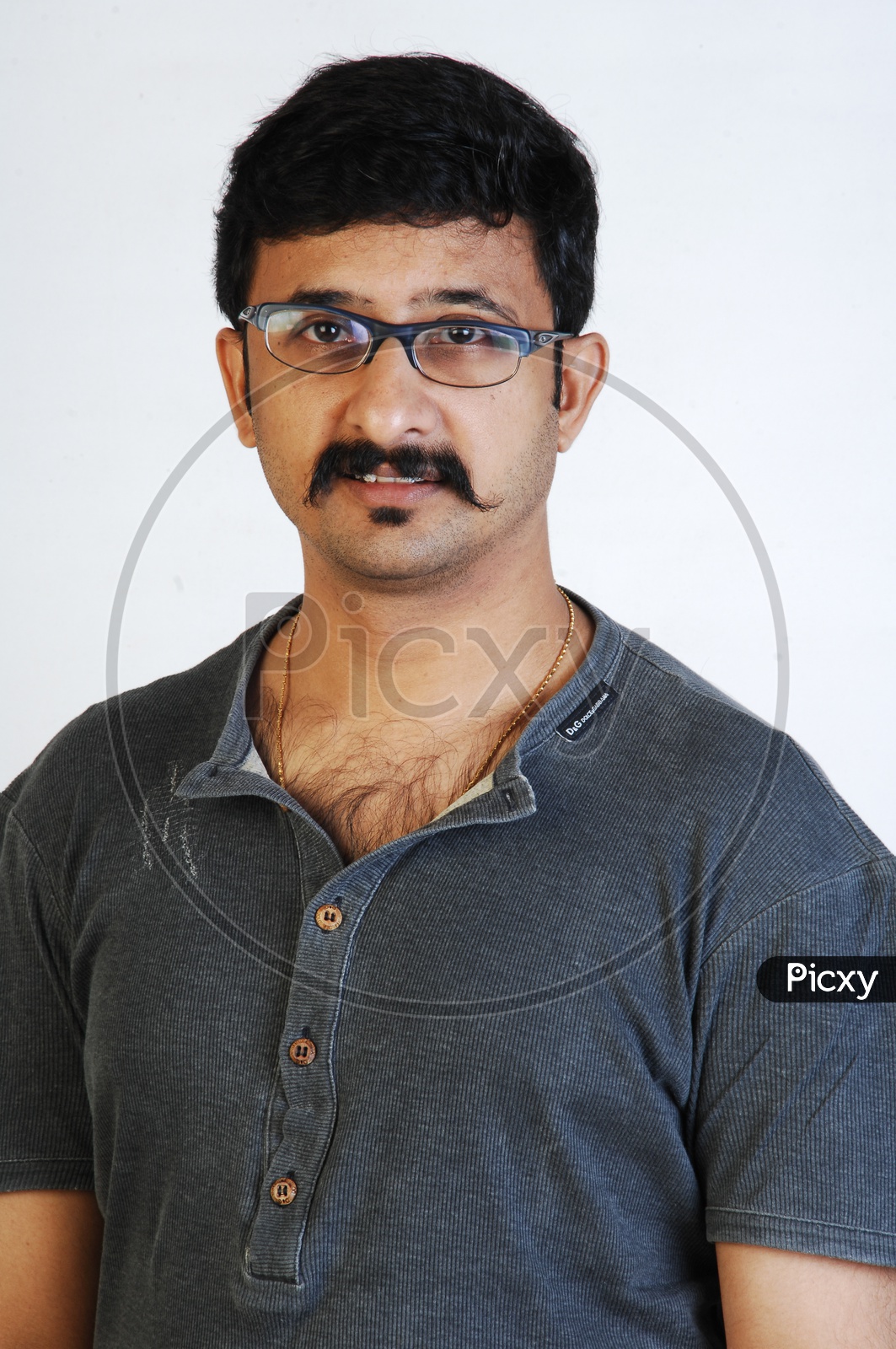 Portrait of Telugu Film  Director And Cinematographer   Teja  With a Smile Face on an Isolated White Background