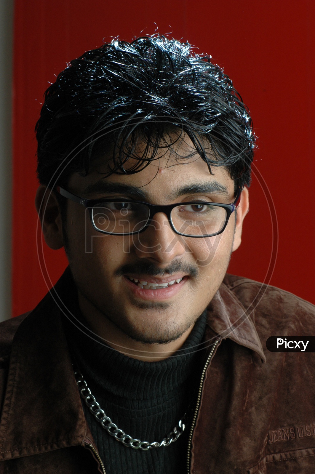 Portrait of a Indian Young Man With an Expression on Face  Over an Isolated white Background