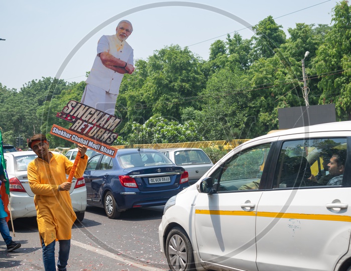 Man holding a banner to support Narendra Modi