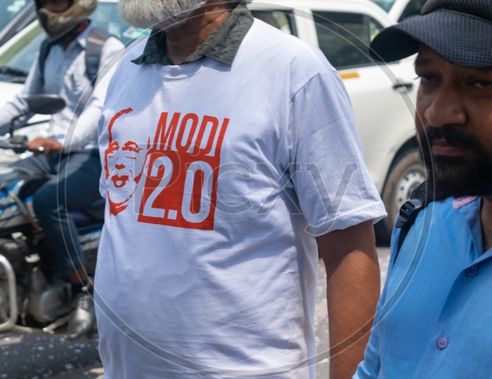 Man wearing a t-shirt to support Bhartiya Janta Party (BJP)