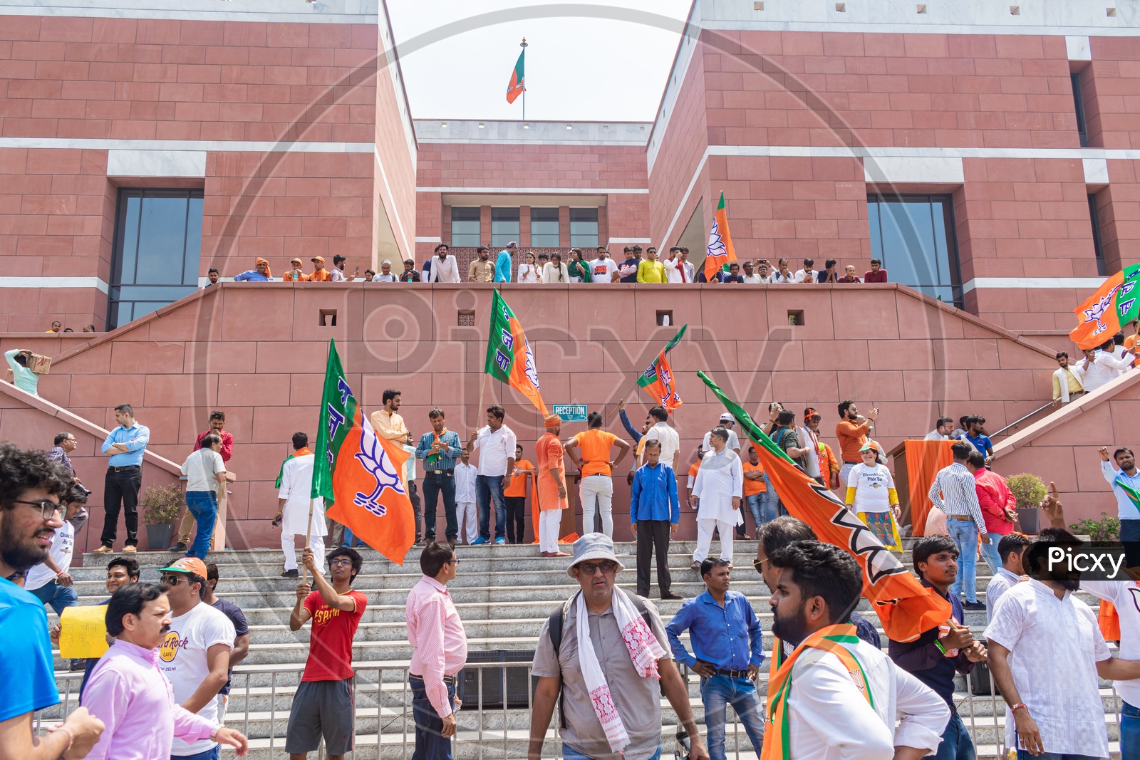Supporters holding flags to support Bhartiya Janta Party(BJP) at th BJP Head Office, Delhi