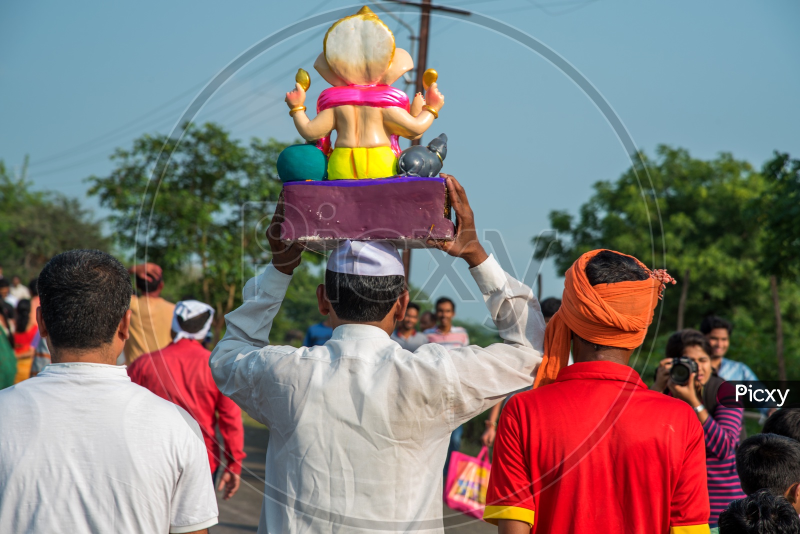Indian Hindu Devotees  Carrying Lord Ganesh  Or Vinakaya   Idols  For  Visarjan  Or  Nimarjan  On The Occasion Of  Ganesh Festival Or Ganesh Chathurdhi  Festival