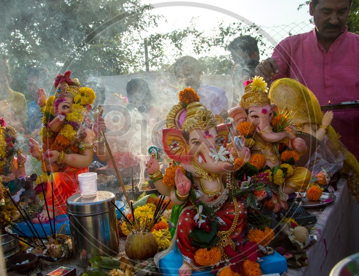 Indian Hindu Devotees Worshiping Lord Ganesh For The Last Time Before Immersion or Visarjan or Nimarjan  During The Ganesh  Chathurdhi Or  Vinayaka Chaviti Festival