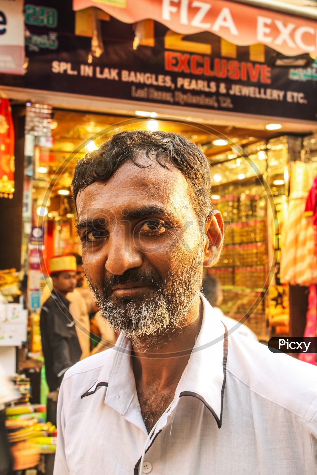 A man selling products during Ramadan in charminar..