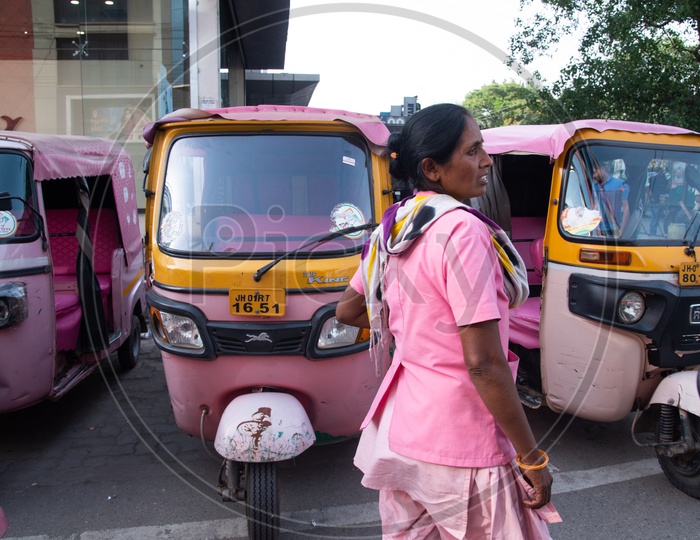 Pink Autos in a Stand  And Woman Auto Driver  Dressed in Pink  In Ranchi City