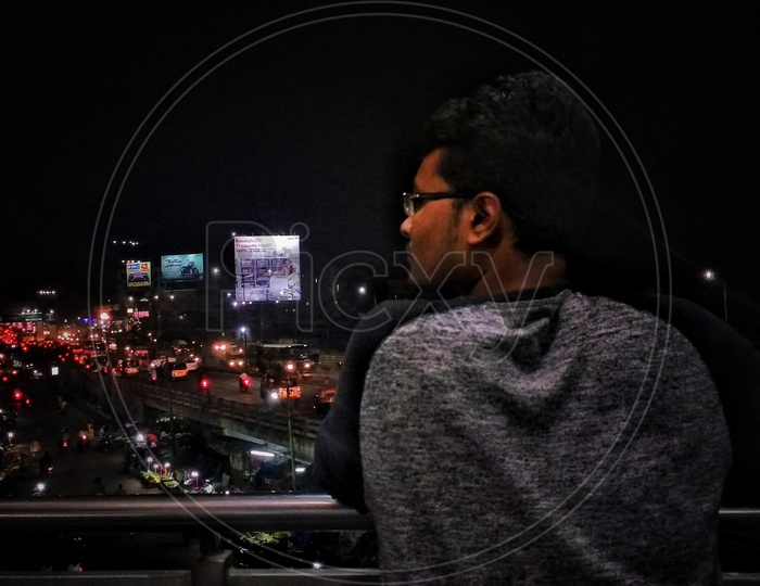 A man watching Hyderabad traffic