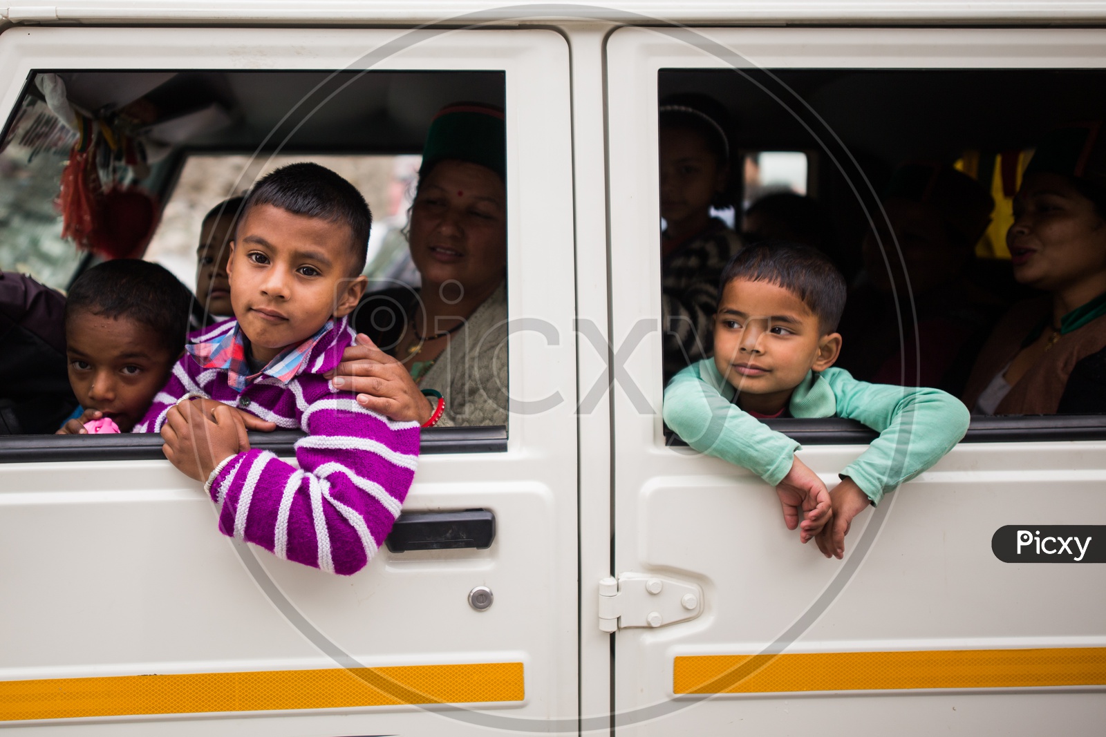 School Children Commuting In a XUV Car on the Ghat Roads Of Kinnaur