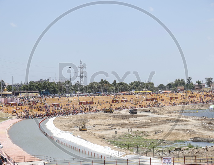 Pilgrims Taking Holy Bath in krishna river vijayawada