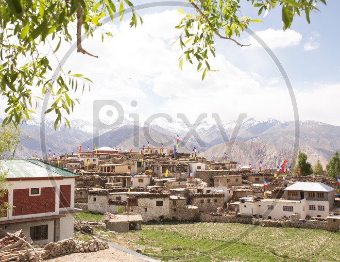 View Of Snow Capped Mountains From The Villages Of Spiti Valley Withh Houses Of Village