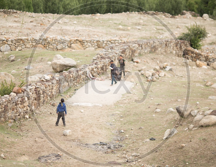 Children Playing Cricket in the Valley Villages Of Spiti