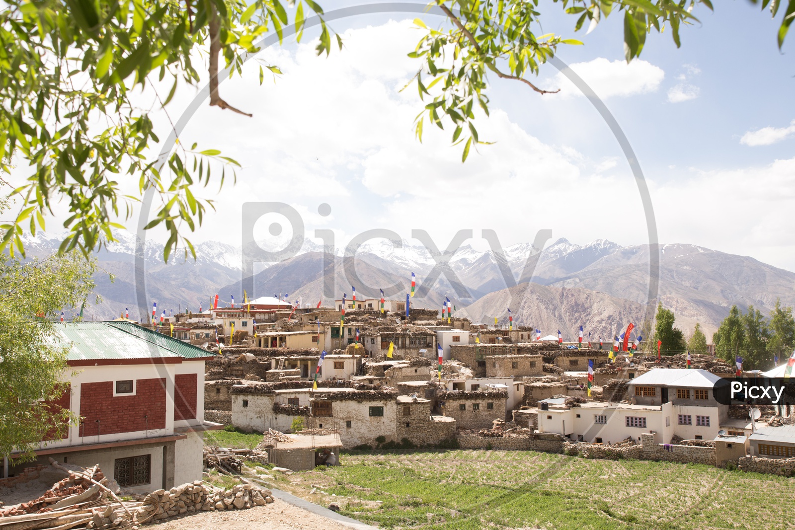 View Of Snow Capped Mountains From The Villages Of Spiti Valley Withh Houses Of Village