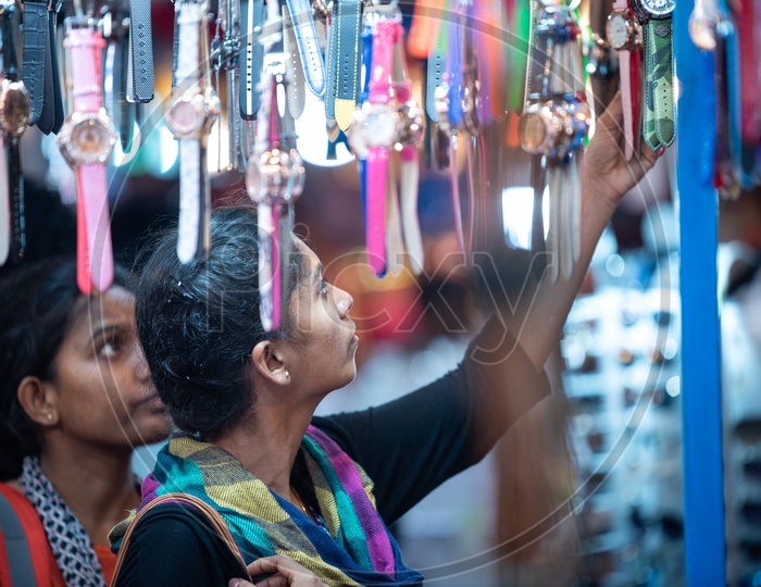 Young Girls   Shopping  Wrist Watches  In a Vendor Stall Around Charminar  During The Ramdan Or Ramzan Season