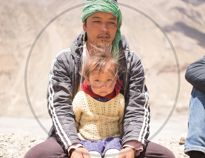 A Father with His Girl Child in Spiti Valley Ghat Roads