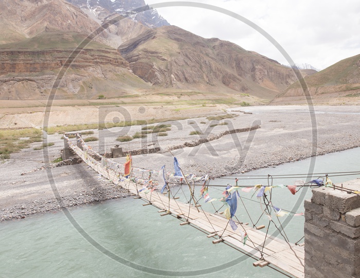 Light Weight  Thread Suspension Bridges Over the River in The Valleys Of Spiti