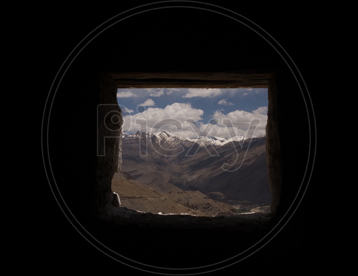 View Of Mountains and Valleys From The Windows of  Houses On the Terrains of Spiti Valley