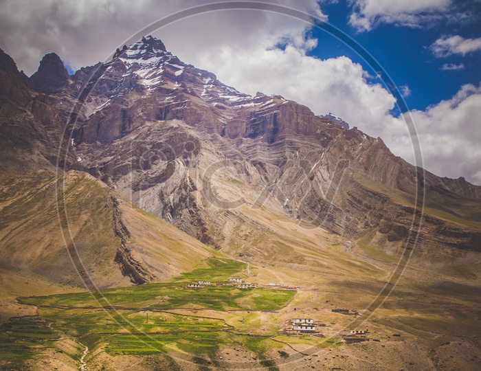 Landscape View with Snow Capped Mountains And Villages In The  River Valleys of Spiti Valley