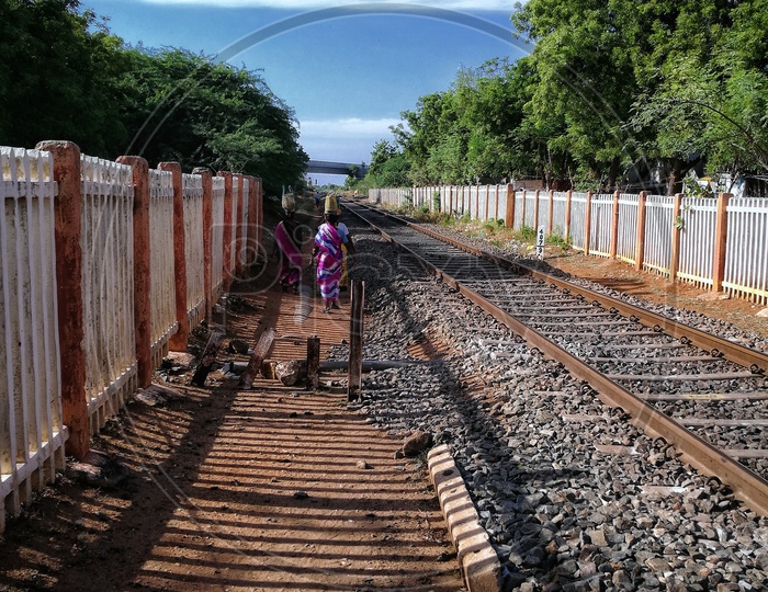 Women walking near Railway Track